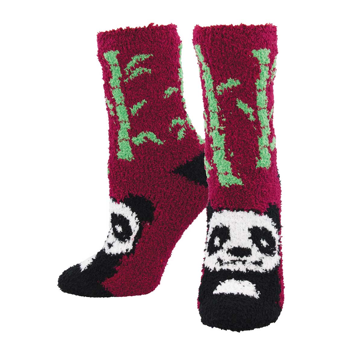 A pair of red fuzzy socks with a panda design and green bamboo motifs.