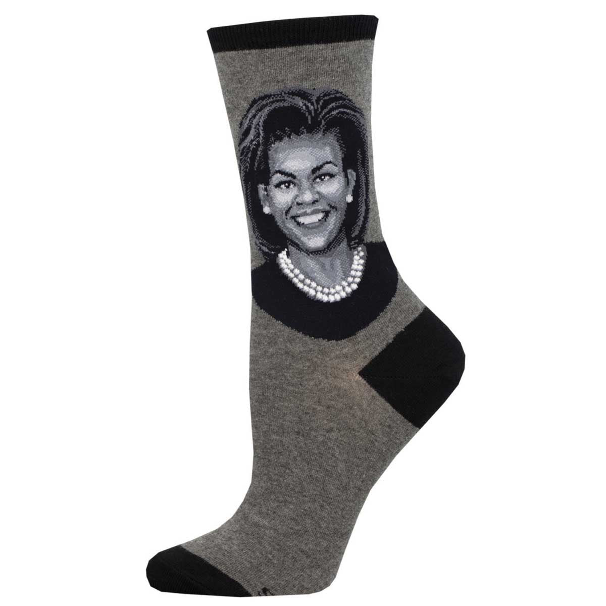 A pair of cotton crew socks featuring a portrait of Michelle Obama, predominantly in gray and black colors.