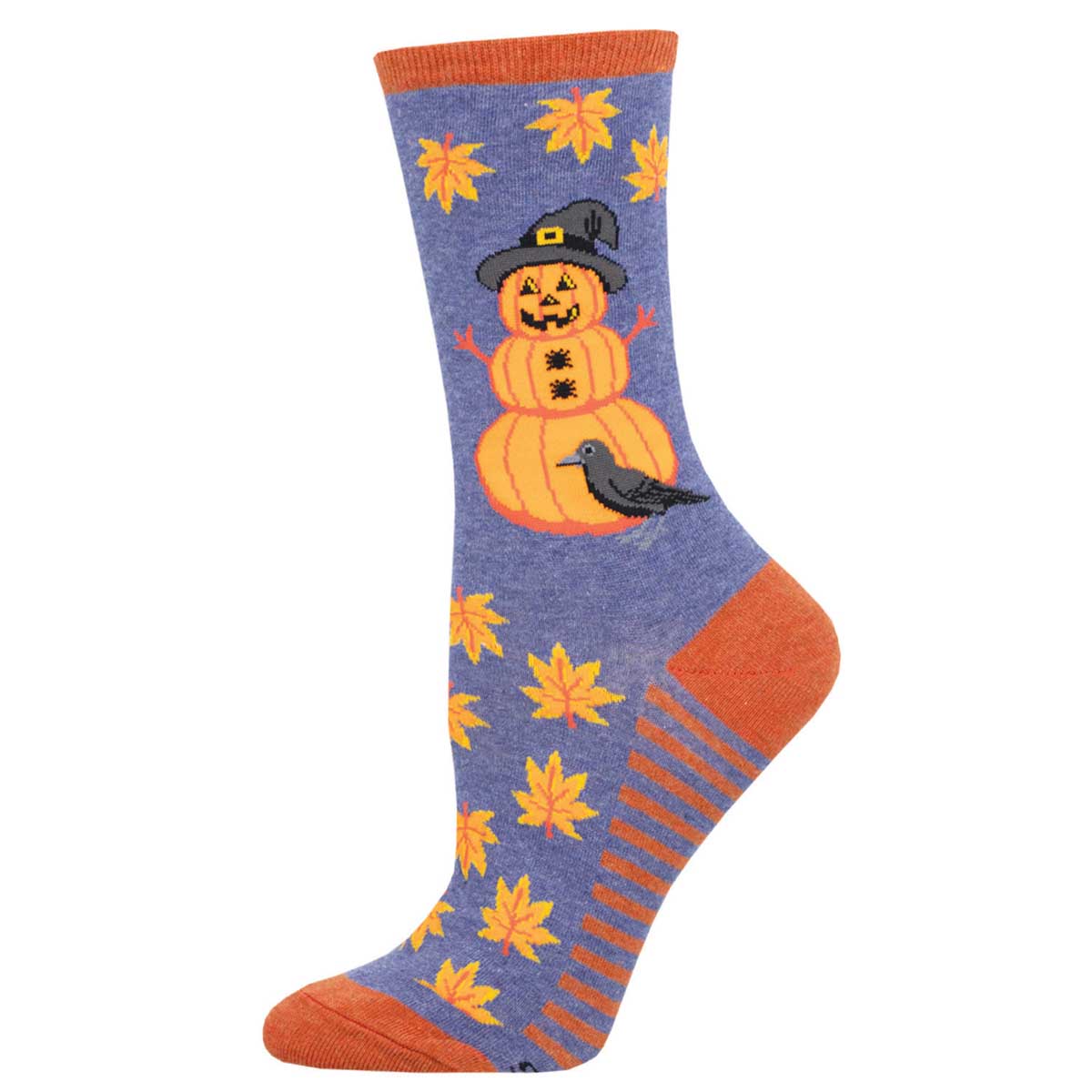A pair of socks with a pumpkin character wearing a hat and a crow design, surrounded by fall leaves on a denim background.