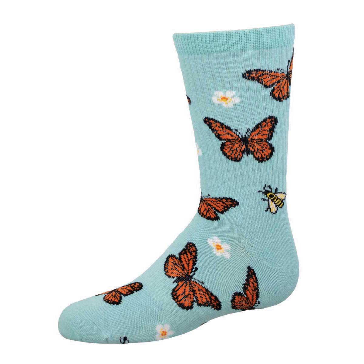 A pair of blue athletic youth socks with a pattern of butterflies and a bee on them, designed for youth.
