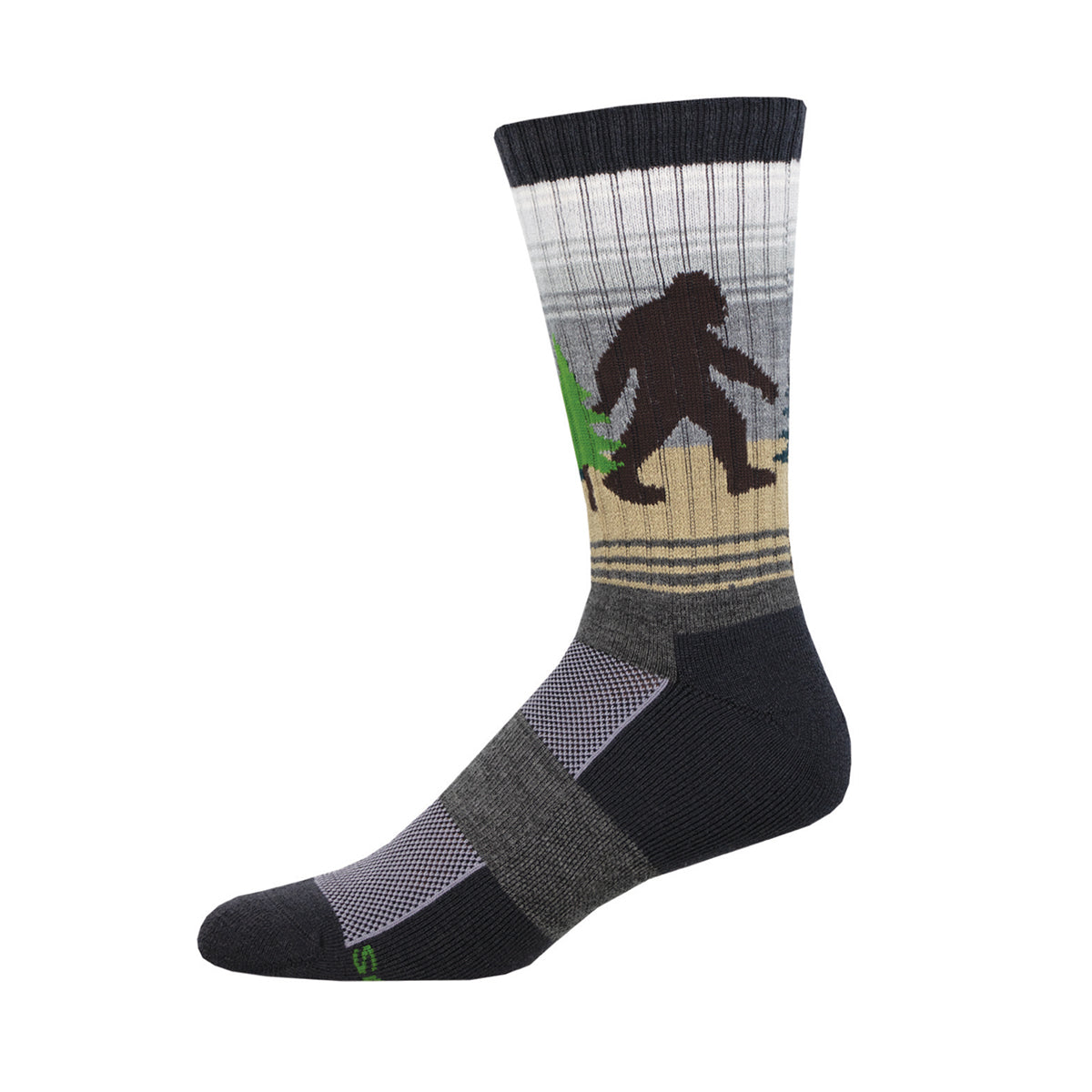 A pair of gray merino wool socks with a pattern featuring a silhouette of a bigfoot walking in a forest.
