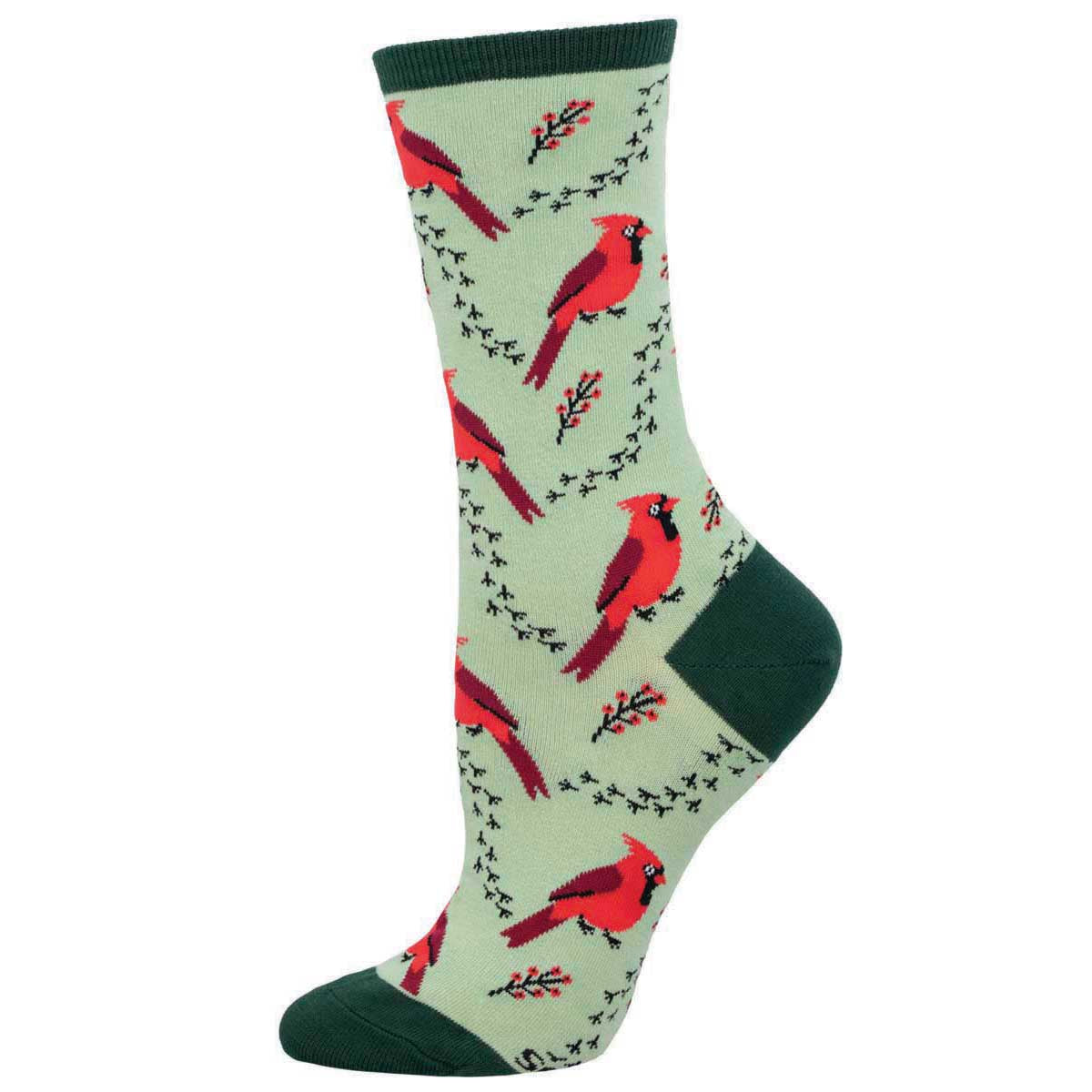A pair of green crew socks with a pattern of red cardinals and greenery.