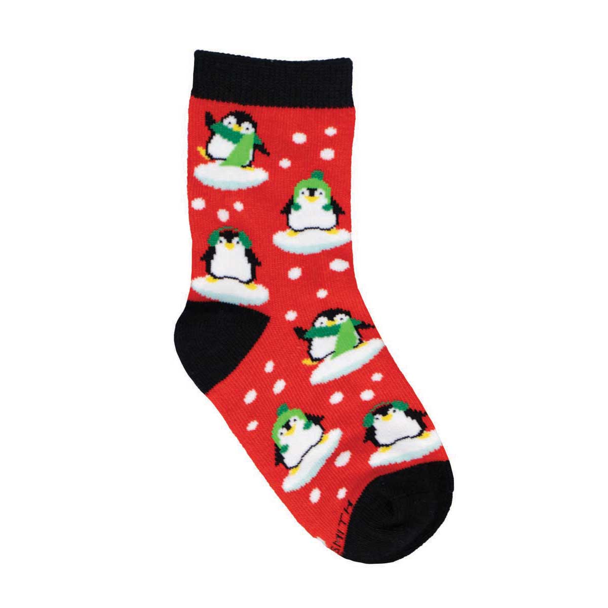A pair of colorful children's socks with cartoon penguin designs on a red background with snowflakes.