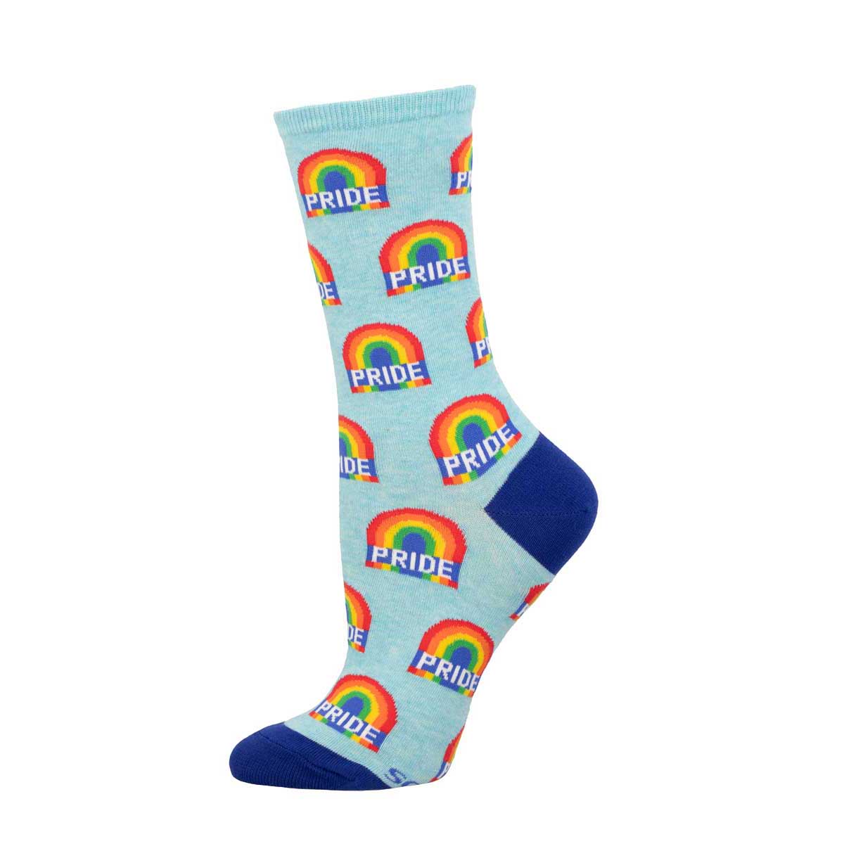 A pair of colorful crew socks with a pattern of rainbows and the word 'PRIDE' repeated across the visible surface.