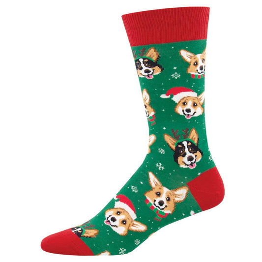 A pair of green and red men's crew socks with a pattern of corgi dogs wearing Santa hats.