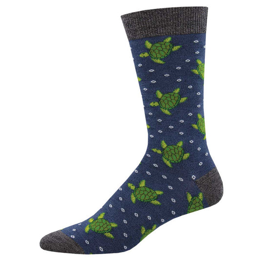 A pair of blue bamboo socks with a pattern of green sea turtles and white bubbles.