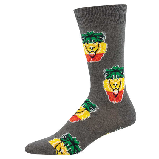 A pair of gray crew socks with a pattern of colorful lion heads in red, yellow, and green.
