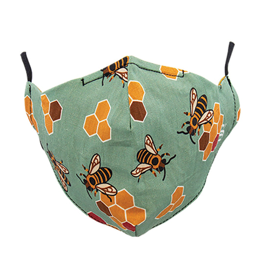 A green fabric face mask with a pattern of bees and honeycombs, featuring adjustable black ear loops.