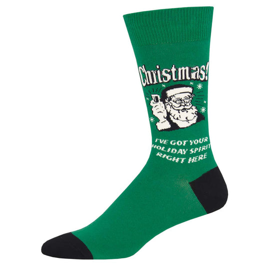 A green crew sock with black trim featuring a Christmas-themed graphic that includes the text 'Christmas' and an illustration of Santa Claus.