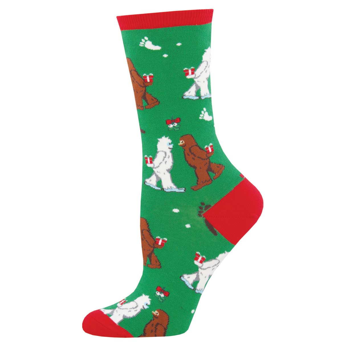 A pair of green and red crew socks with a pattern of yetis and bigfoots wearing Christmas hats.