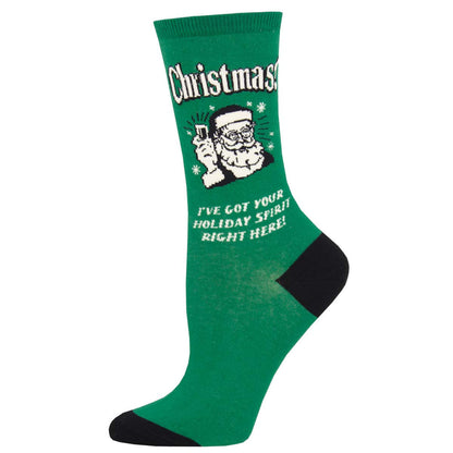 A green and black crew sock with a Christmas-themed design featuring Santa Claus and the text 'Christmas! I've got your holiday spirit right here!'.