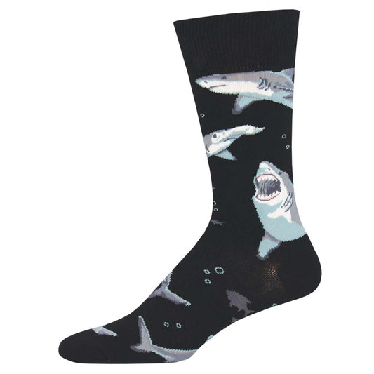A black sock with a pattern of white and grey sharks swimming in a group.