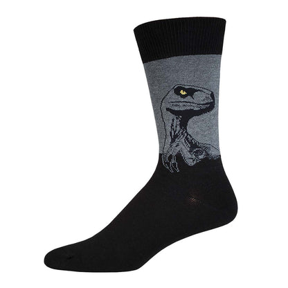 A pair of crew socks featuring a gray velociraptor design on a black background.