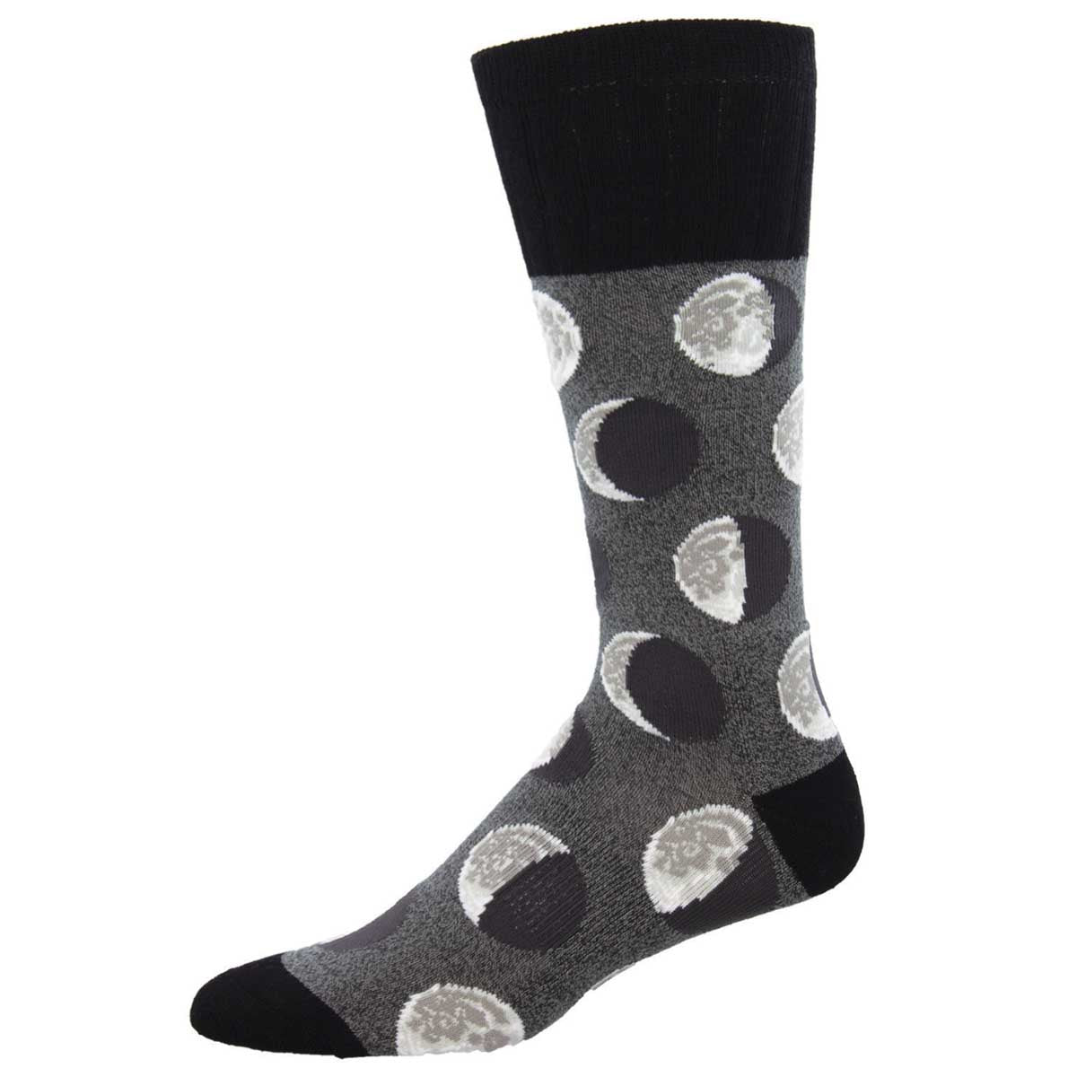 A pair of gray socks with a pattern of moons in different phases, the socks have a black heel and toe.