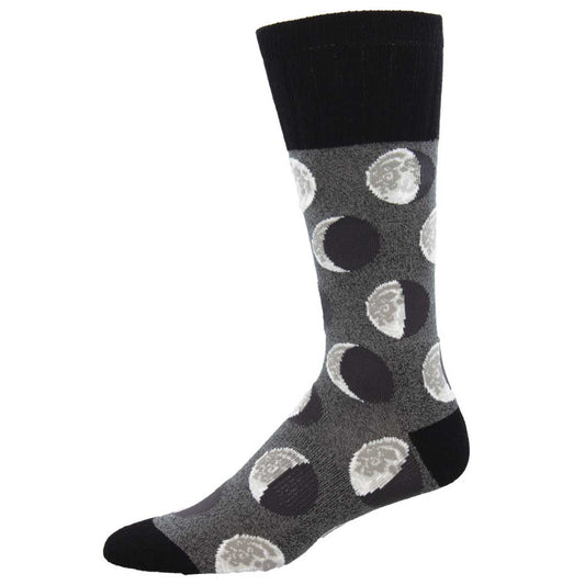 A pair of gray socks with a pattern of moons in different phases, the socks have a black heel and toe.