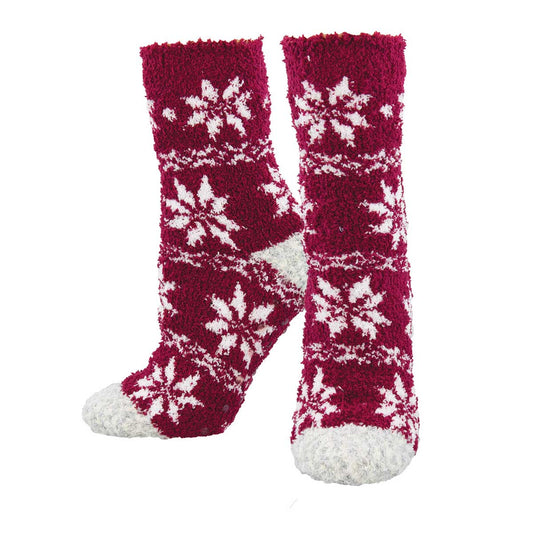 A pair of red and white fair isle patterned cozy socks designed for warmth and comfort, suitable for indoor wear.