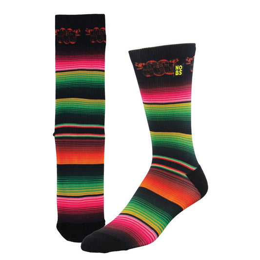 A pair of socks with a colorful geometric pattern, predominantly featuring red, green, and black stripes, with a text that reads 'NO BS' visible on one of the socks.