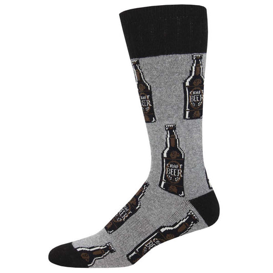 A pair of men's socks with a pattern of beer bottles and text that says 'Craft Beer'.