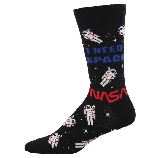 A black sock with the text 'I NEED SPACE' and the NASA logo, featuring astronaut figures and stars.