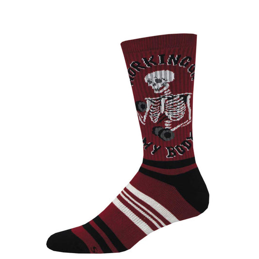 A pair of athletic crew socks with a red and black color theme, featuring a skeleton design and text that reads 'WORKING OUT MY FITNESS.'.