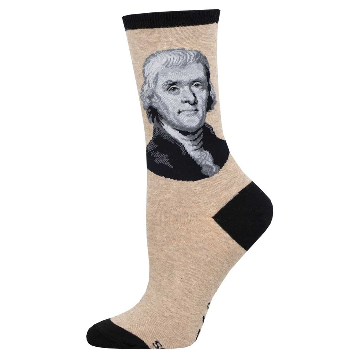 A pair of socks featuring a portrait of Thomas Jefferson on a beige background with black trim.