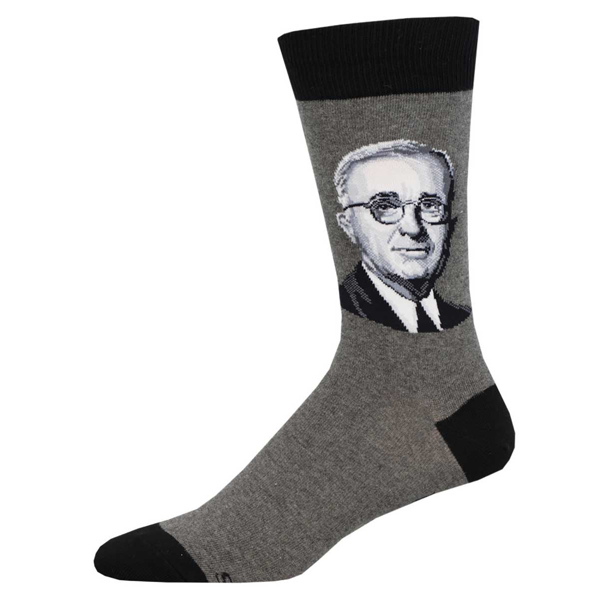 A pair of gray crew socks with a portrait of President Truman on the side, featuring black and red color accents at the heel and toe.