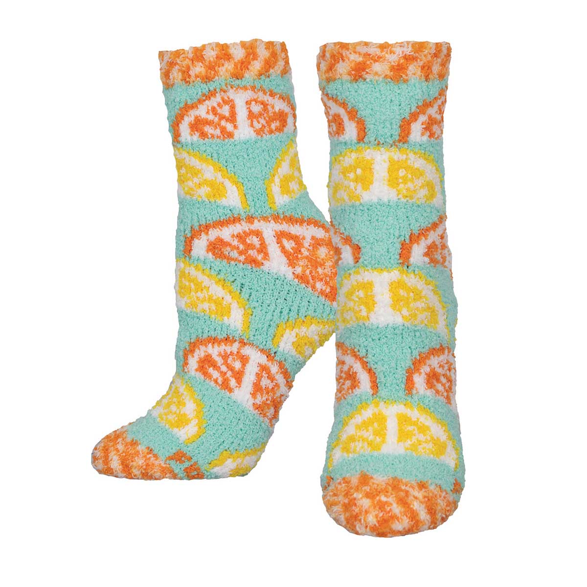 A pair of fuzzy socks with a pattern of orange and lemon slices on a light blue background.