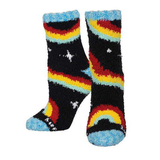A pair of fuzzy socks with a colorful striped pattern, featuring black, red, yellow, and blue hues, along with white accents.