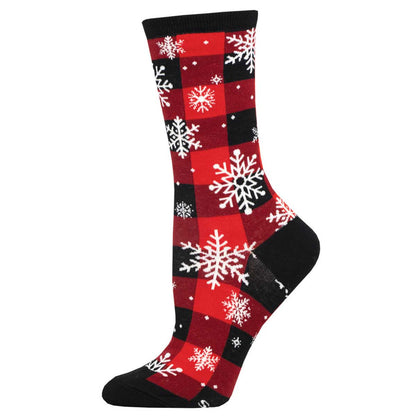 A pair of black and red plaid socks with white snowflake patterns on them, designed for women.