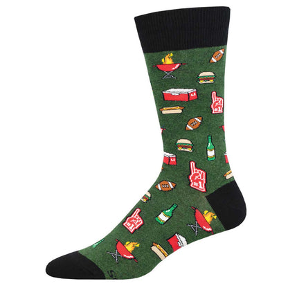 A pair of green crew socks with various food and drink related graphics such as hot dogs, bottles, and grills.