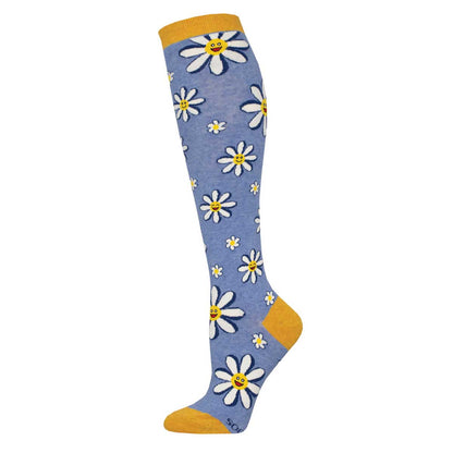 A pair of knee-high socks with a floral pattern featuring white daisies and yellow accents on a heather blue background.
