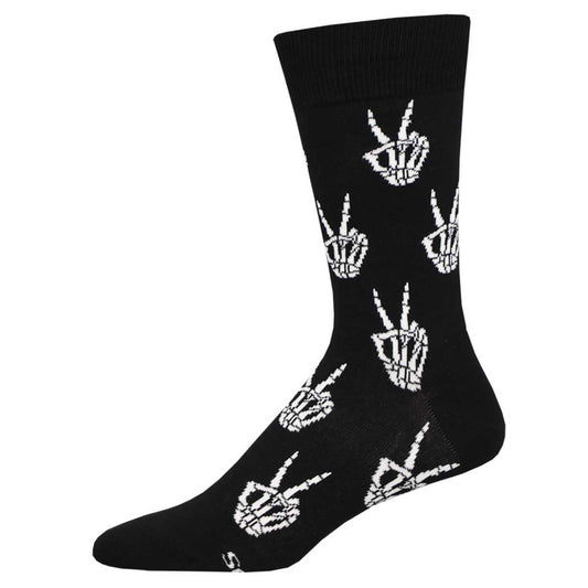 A black crew sock with a pattern of white peace signs.