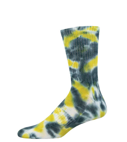 A tie-dye patterned athletic crew sock in shades of green, yellow, and white.