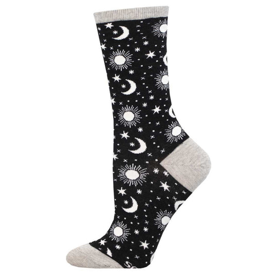 A pair of black cotton crew socks with a pattern of moons, suns, and stars in white.