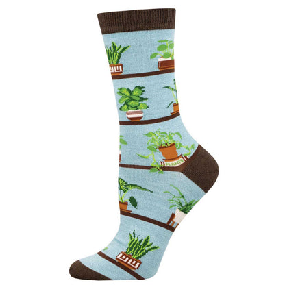 A pair of socks with a pattern of bamboo plants on a light blue background, arranged in a vertical layout.