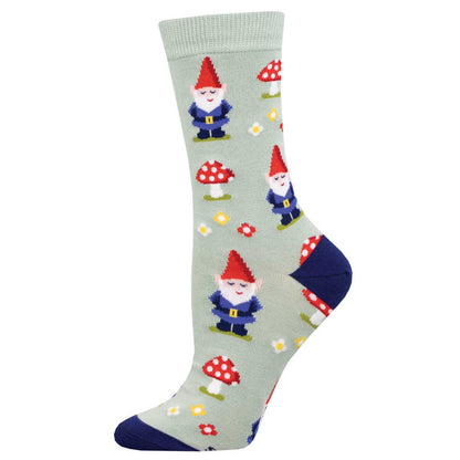 A pair of light green crew socks with a pattern of mushrooms and gnomes in green and red.
