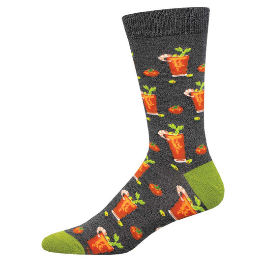 A pair of socks with a pattern of bloody mary cocktails and garnishes on a gray background with green at the heel and toe.