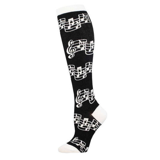 A pair of knee-high socks with a pattern of white musical notes on a black background.