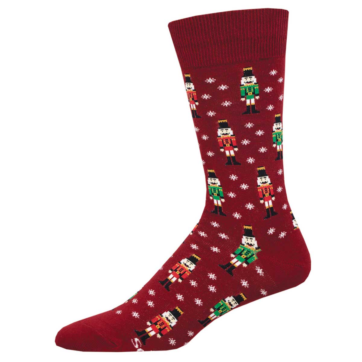 A pair of red crew socks with a Christmas nutcracker pattern and snowflakes.