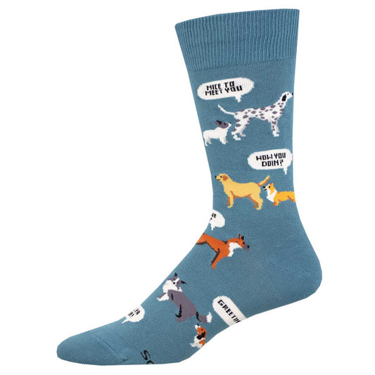 A pair of blue crew socks with a pattern of various cartoon dogs in different poses and a text bubble that says 'Wanna hang?' amongst other things