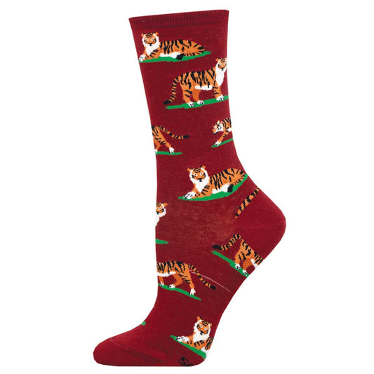 A pair of red crew socks with a pattern of tigers.