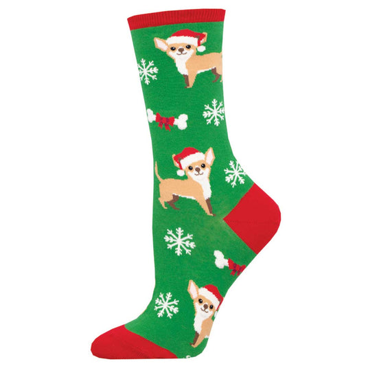 A pair of Christmas-themed socks featuring small dogs with holiday accessories, green background with red trim and white snowflakes.