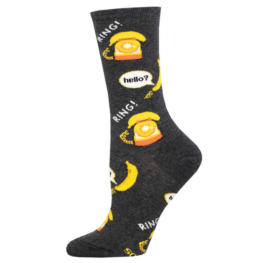 A pair of gray crew socks with a pattern that includes bananas and the text 'hello?' and 'RING!'