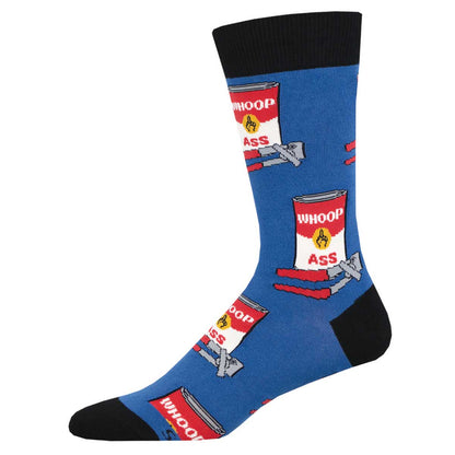 A pair of blue crew socks with a graphics pattern of cans of whoop ass and the middle finger