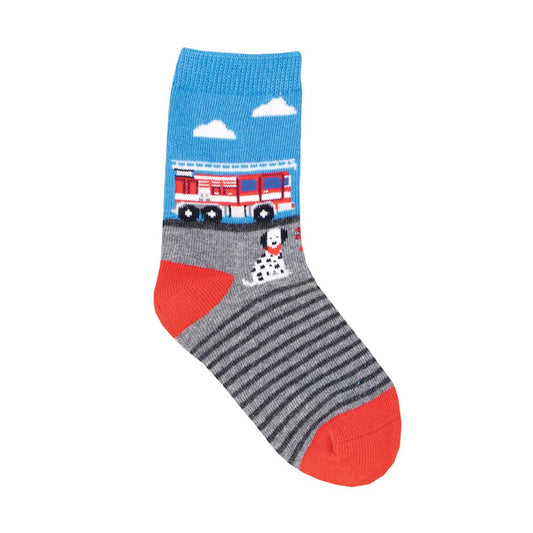 A colorful sock with a pattern that includes a fire engine and a dalmatian dog.