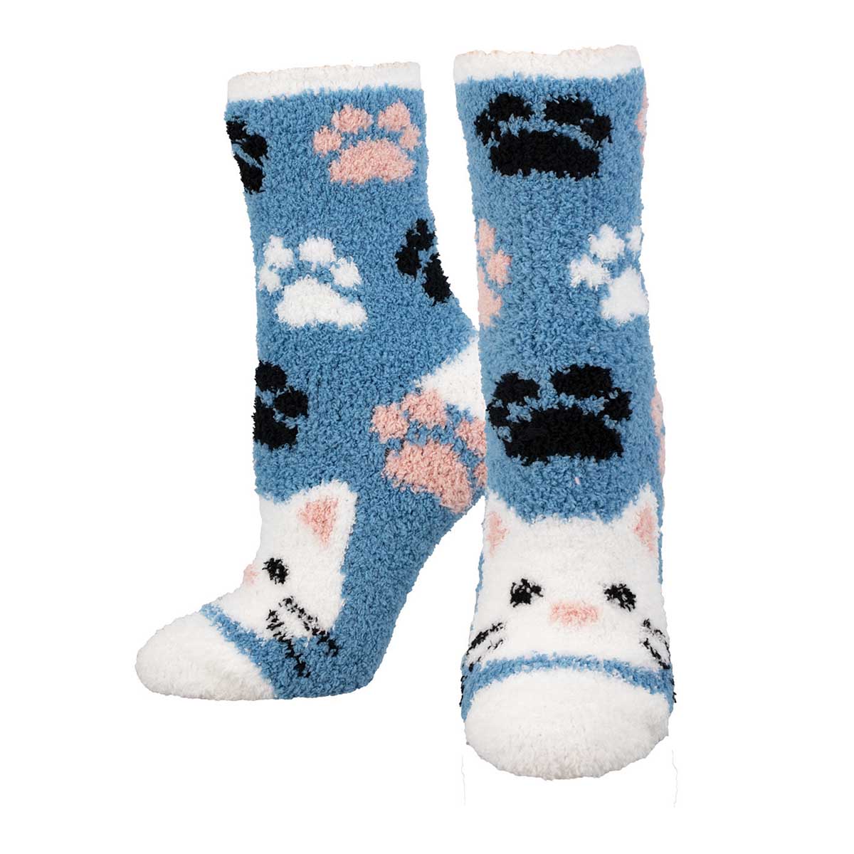 A pair of blue fuzzy socks with white and black cat face patterns and pink paw prints.