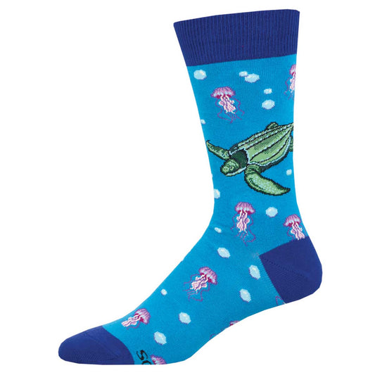 A pair of blue crew socks with a pattern featuring a leatherback turtle and jellyfish.
