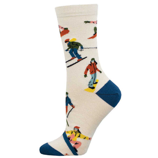 A pair of white bamboo socks with a pattern of skiers and snowboarding graphics.