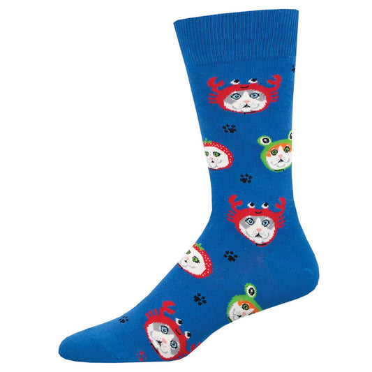A pair of blue socks with a pattern of cat faces in various colors and accessories.