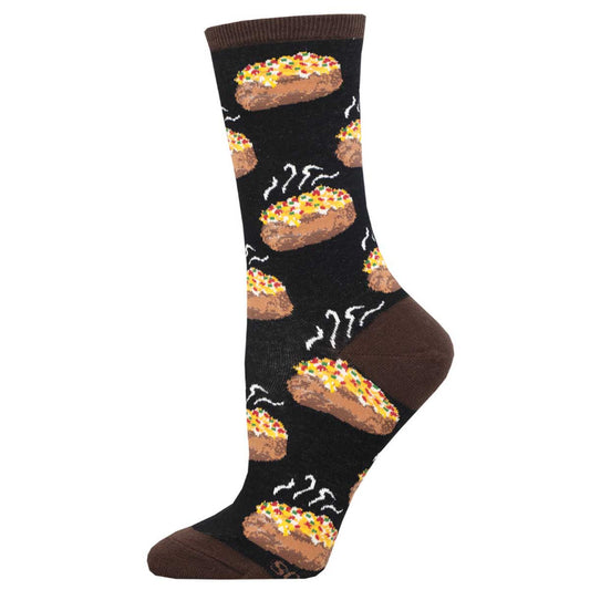 A pair of black cotton crew socks with a pattern of baked potatoes with toppings.